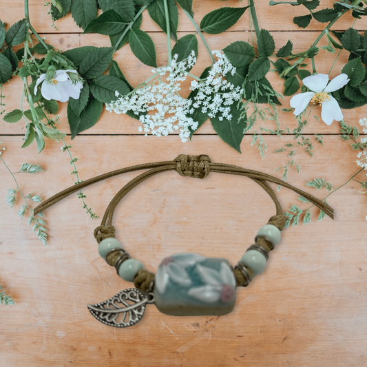 Floral Harmony Adjustable Bracelet – Be Lifted Up Collection-Ceramic beaded bracelet with charm accompanied by a 4x4 Bible verse card